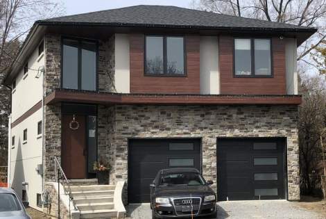 Luxury Home with Amazing Stone Siding by Exterior by Design Etobicoke