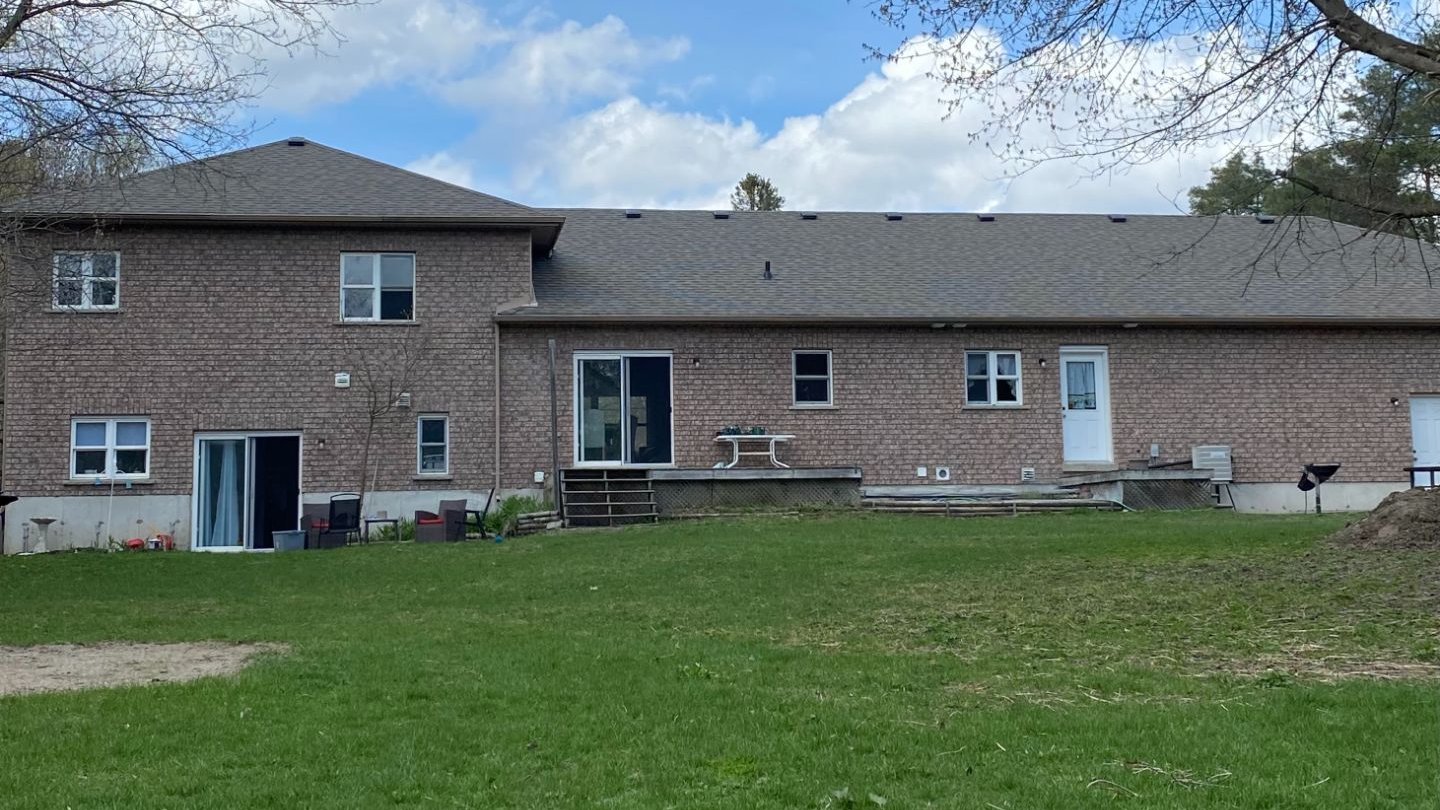 exterior of the home before stucco installation